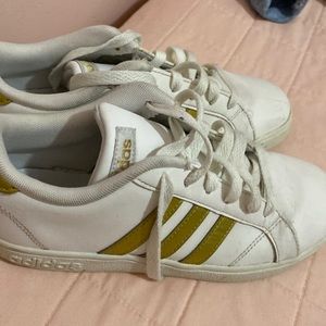 White and gold Adidas